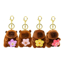 Brelok do kluczy pluszowa puchata Kapibara z obrotowym kwiatkiem BRL385